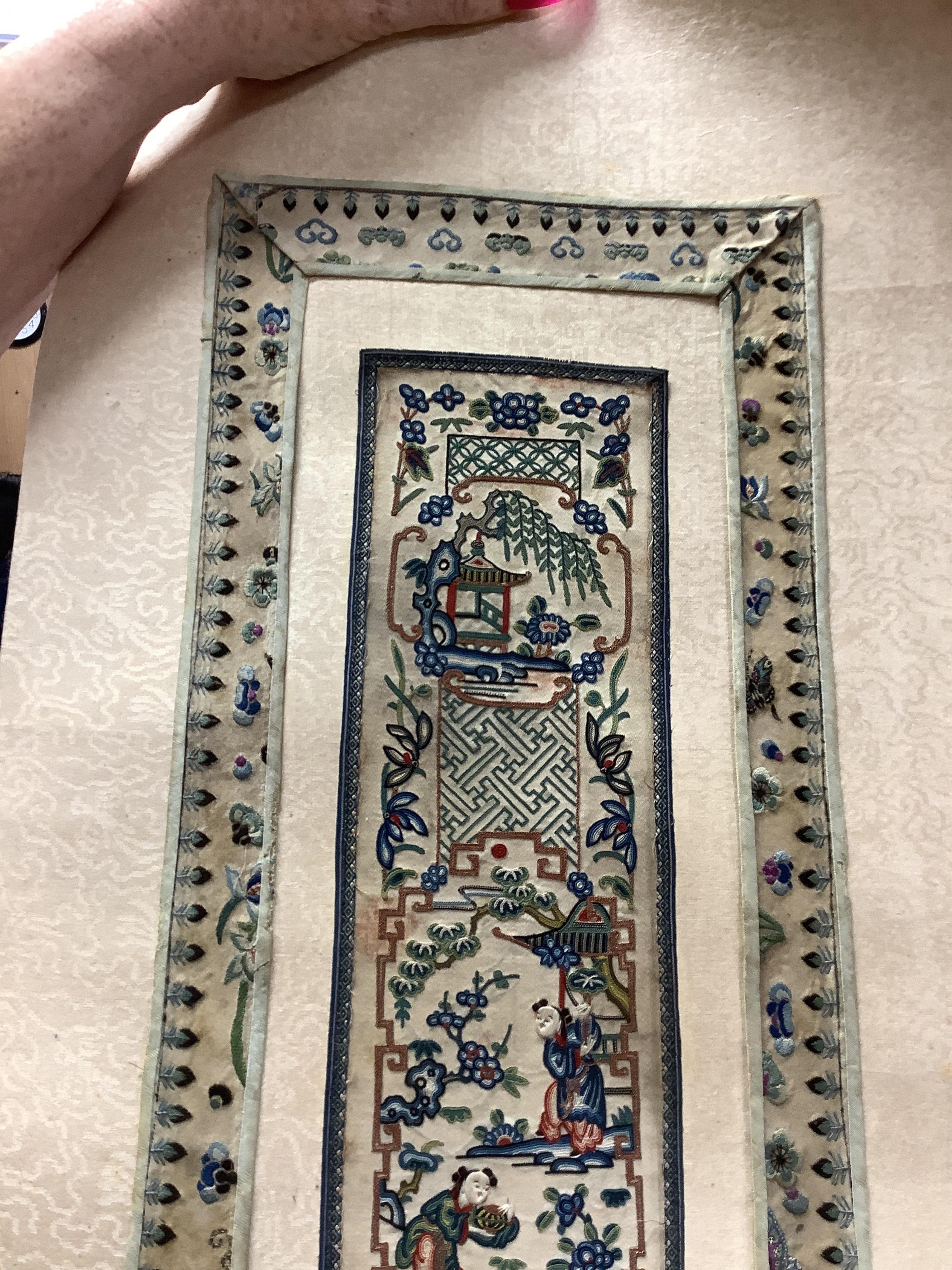 A pair of Chinese silk embroideries, in scroll form